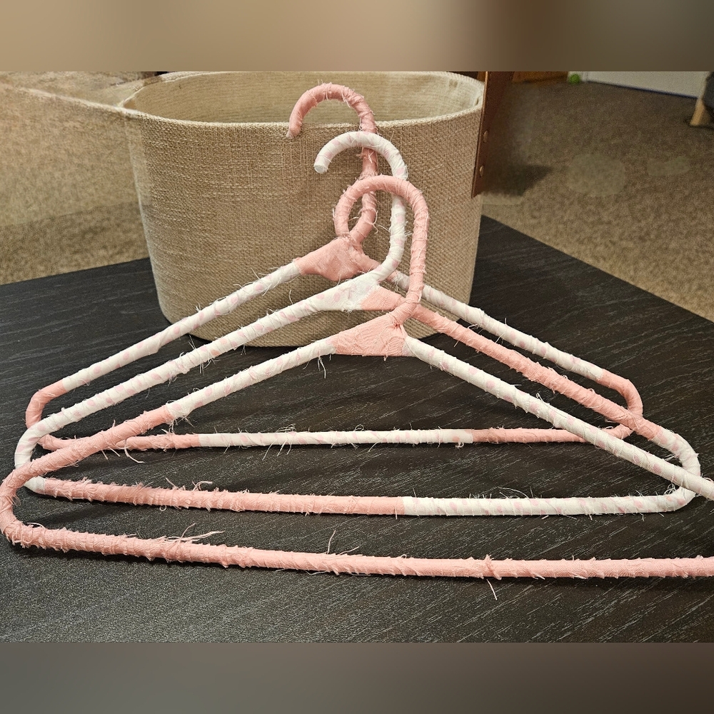 Pink and White Fabric-Covered Hangers